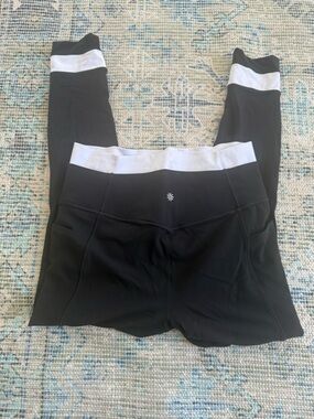 Athleta, white and black salutation leggings